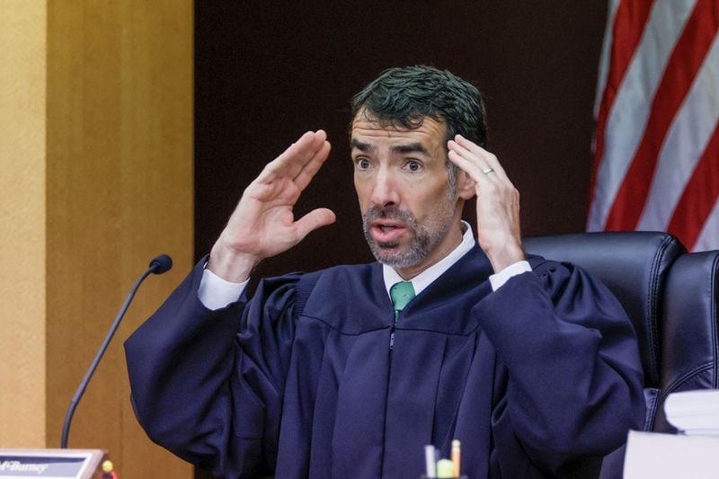 Judge Robert McBurney answers questions from defense attorney Donald F. Samuel during Claud “Tex” McIver’s retail as the court prepares for jury selection on Monday, Dec. 4, 2023.
Miguel Martinez /miguel.martinezjimenez@ajc.com