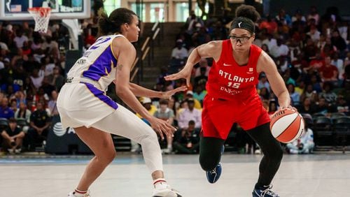 Guard Allisha Gray of the Atlanta Dream dribbles the ball while guarded by guard Rae Burrell of the Los Angeles Sparks on Sunday, June 16 , 2024, in Atlanta, at Gateway Center Arena. (Atlanta Journal-Constitution/Jason Allen)