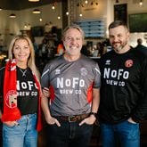 Shannon Miles (from left), Bryan Miles and Joe Garcia are founders of NoFo Brew Co. Shannon and Bryan Miles also are among the owners of the Walsall football club in England. (Courtesy of Andy Brophy)
