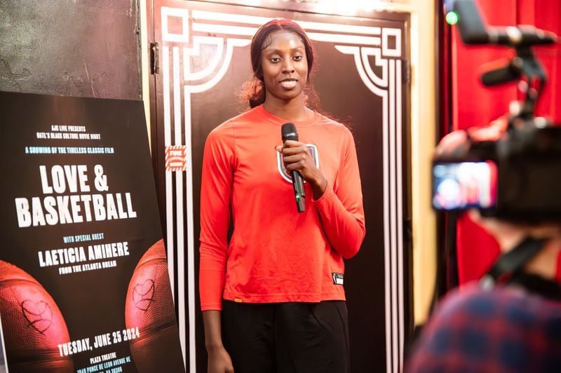 Atlanta Dream forward Laeticia Amihere records a video drop for UATL at the franchise's second Movie Night at Plaza Theater on June 25, 2024.