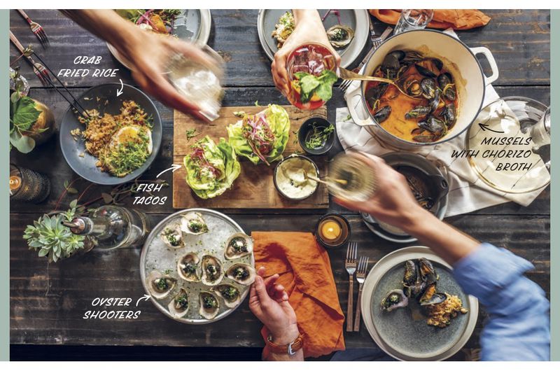 A photo spread of seafood recipes featured in "The Kitchen Cookbook," by Kimbal Musk.