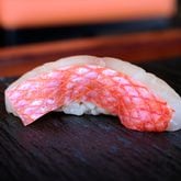 A piece of nigiri at Omakase Table in West Midtown. Aug. 14, 2023 (Credit: Omakase Table/Brandon Amato)