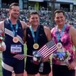 Kennesaw State assistant track coach Daniel Haugh (center) won the hammer throw competition at the U.S. Olympic Trials on Sunday to qualify for the Paris Games.