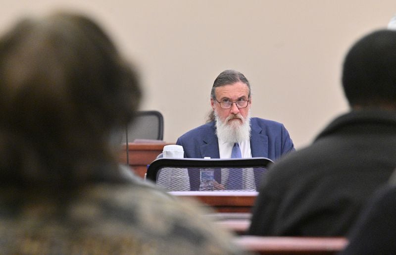 January 31, 2022 Americus - Attorney William McCall Calhoun sits next to his client Deontrey Parker (not pictured) during jury selection for alleged drug-related murder trial before Superior Court Judge Jimmie Brown (not pictured) at Sumter County Courthouse in Americus on Monday, January 31, 2022. Americus attorney William McCall Calhoun is out on bond and facing felony charges related to his activities at the U.S. Capitol on Jan. 6, 2021. While on bond, he is subject to home confinement and GPS monitoring (ankle monitor). (Hyosub Shin / Hyosub.Shin@ajc.com)