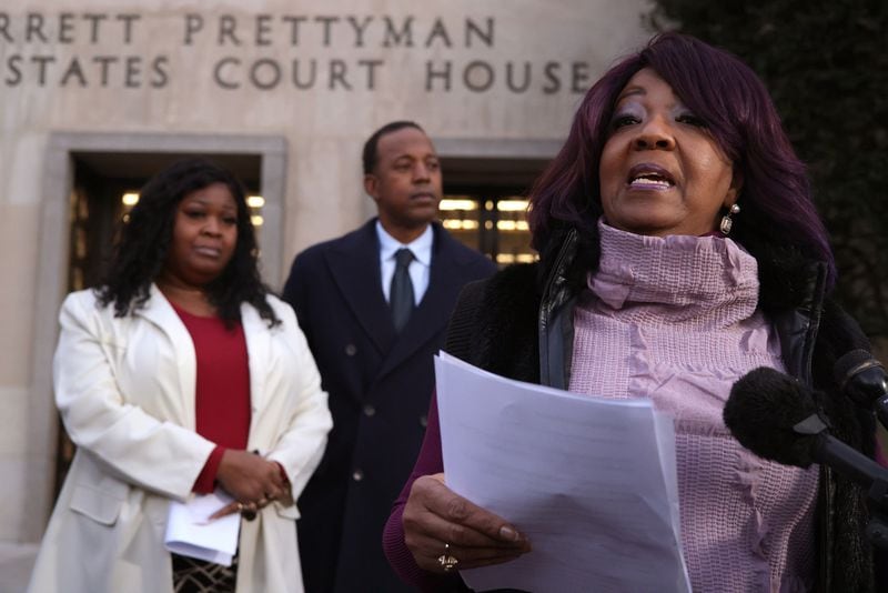 Georgia election workers Ruby Freeman and her daughter, Shaye Moss, speak outside of the  E. Barrett Prettyman U.S. District Courthouse on Friday, Dec. 15, 2023, in Washington, D.C. A jury has ordered Rudy Giuliani, the former personal lawyer for former President Donald Trump, to pay $148 million in damages to the pair. (Alex Wong/Getty Images/TNS)