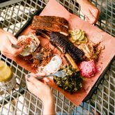 Central Texas-style smoked meats are on the menu at Lewis Barbecue, set to open in Atlanta in 2025. / Courtesy of Lizzy Rollins