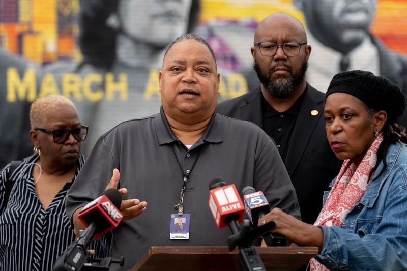 Atlanta city Councilman Michael Bond speaks to the media regarding recent violence in Vine City. Community members and city leaders gather to speak and demand action on gun violence in the Vine City area. Wednesday, April 10th, 2024 (Ben Hendren for the Atlanta Journal Constitution)