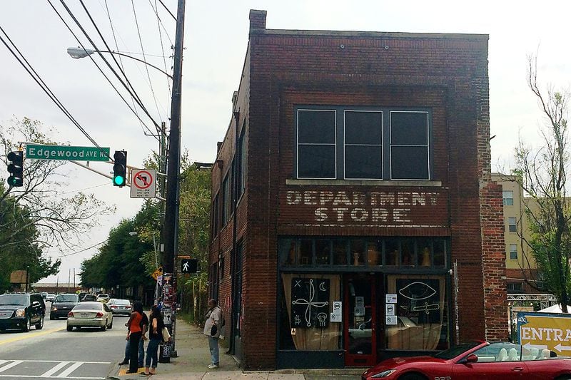 The Brown-Hayes Department Store at Edgewood Avenue and Boulevard: Once at the center of African American commerce, this building is now at the center of today's Edgewood nightlife district. Built in 1899, it's still the site of many an art project. The building even has its own Facebook page. The "Brown-Hayes" part of the name at top is pretty faded on this side. (PETE CORSON / PCORSON@AJC.COM) 