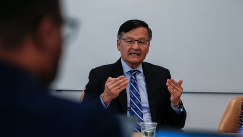 Emory Healthcare CEO Dr. Joon Lee speaks at the AJC's June 12 editorial board meeting, where he revealed the hospital system started allocating money for pay increases back in March. Photo by Ziyu Julian Zhu / AJC