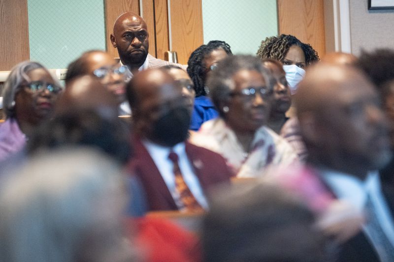 Nathan Wade sits in the back of the sanctuary as Fulton County District Attorney Fani Willis addressed the Sixth Episcopal District of the African Methodist Episcopal Church’s annual planning meeting at Turner Chapel AME Church in Marietta on Thursday, June 13, 2024.   (Ben Gray / Ben@BenGray.com)