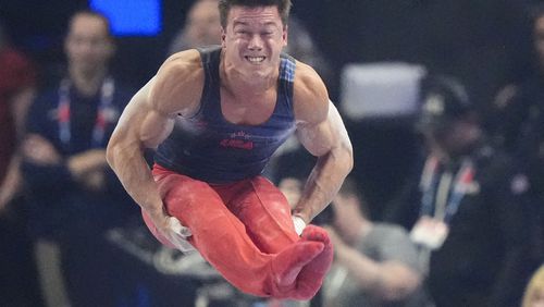 Brody Malone of Rockmart competes on the parallel bars at the United States Gymnastics Olympic Trials on Thursday, June 27, 2024 in Minneapolis. (AP Photo/Charlie Riedel)