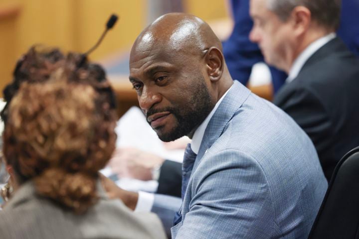 Deputy District Attorney Will Wooten prepares to argue before Fulton County Superior Judge Scott McAfee as he hears motions from attorneys representing Ken Chesebro and Sidney Powell in Atlanta on Wednesday, Sept. 6, 2023.  (Jason Getz / Jason.Getz@ajc.com)