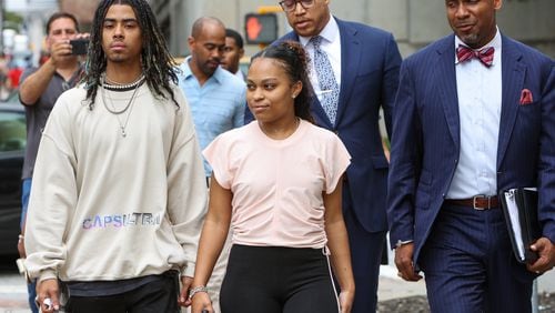 (l-r)Messiah Young and Taniyah Pilgrim, the two college students tased by APB officers in 2020, walk with attorneys Justin Miller & Maul Davis to a news conference at the Fulton County Courthouse after criminal charges against the officers were dropped. PHIL SKINNER FOR THE ATLANTA JOURNAL-CONSTITUTION.