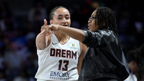 Atlanta Dream head coach Tanisha Wright instructs guard Haley Jones (13) during the first half at the Gateway Center Arena on July 2, 2024, in Atlanta. The Dream lost 85-77.  (Hyosub Shin / AJC)
