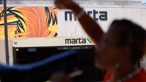 CEO of Georgia Stand-Up, Deborah Scott, uses a megaphone to protest MARTA’s announcement to close the station for renovations on Tuesday, June 25, 2024
(Miguel Martinez / AJC)