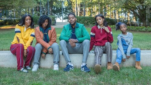 Designer Quintin Crumpler, center, and members of his family are wearing merchandise from his line, Goat by James King. Crumpler founded the Atlanta-based brand in 2018. (Contributed)