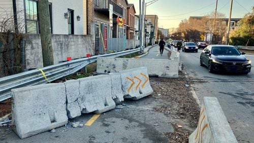 The highway exit from I-20 onto Bill Kennedy Way near Glenwood Park has been the site of multiple accidents. Some cars exiting the ramp plow through concrete barricades and onto the Atlanta Beltline, putting cyclists and pedestrians at risk. Image credit: Ken Boff.
