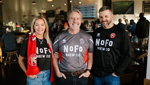 Shannon Miles (from left), Bryan Miles and Joe Garcia are founders of NoFo Brew Co. Shannon and Bryan Miles also are among the owners of the Walsall football club in England. (Courtesy of Andy Brophy)