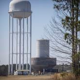 A water tower under construction, center, at the edge of the Hyundai Metaplant site that will be used to hold groundwater pumped from Bulloch County, Wednesday, Feb. 21, 2024, Ellabell, Ga. (AJC Photo/Stephen B. Morton)