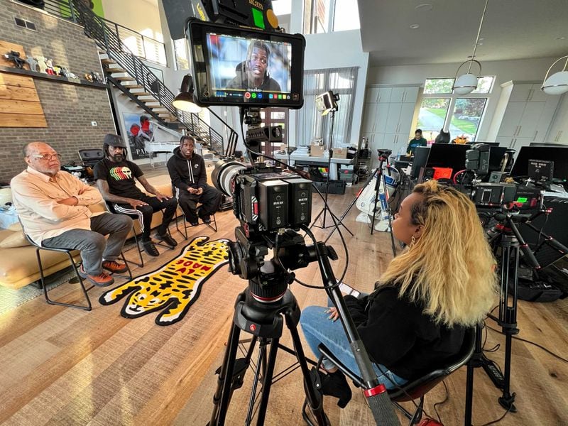 DeAsia Paige interviewing Philip McCollum, Shannon McCollum and Lil Yachty for "The South Got Something to Say" documentary.