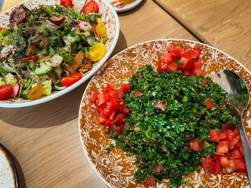 The tabouli and fatoush salads at Raik Mediterranean were fresh and distinctive. (Henri Hollis/henri.hollis@ajc.com)