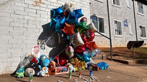 A vigil was held Wednesday for Lamon Freeman and Jakody Davis, who were fatally shot Tuesday at an Oakland City neighborhood apartment complex.