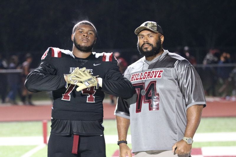Georgia Tech offensive lineman Ben Galloway, left, and his dad Kenya Galloway when Ben Galloway was a player at Hillgrove High School in Cobb County. Kenya Galloway died Jan. 4, 2024. (Photo contributed by Ben Galloway via Georgia Tech Athletics)
