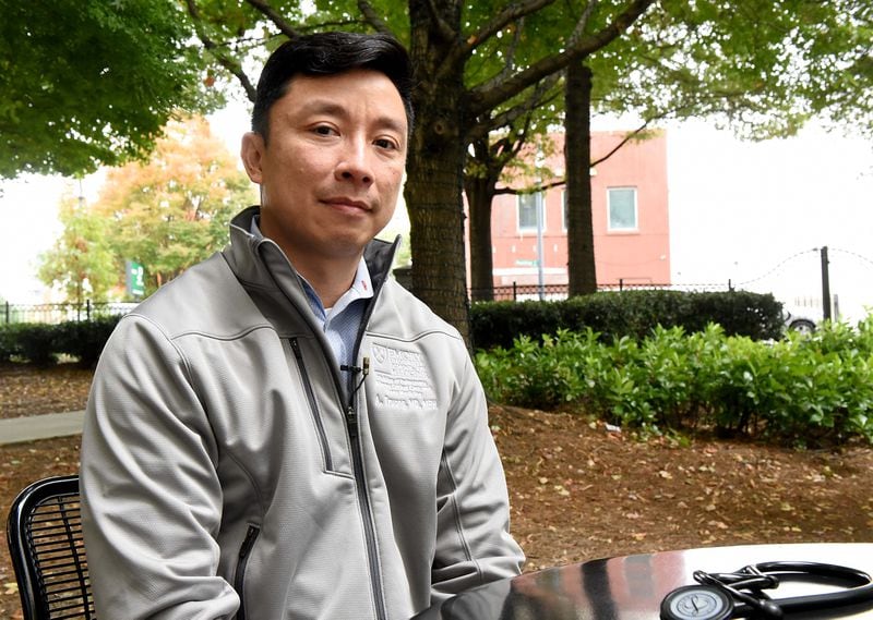 Dr. Alex Truong, an Emory pulmonologist who helped start a long COVID clinic, says that when patients see him, “they finally find somebody who can validate them as what they are going through and there may be some things we can help." (Ryon Horne/RHORNE@AJC.COM)