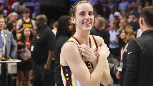 Indiana Fever guard Caitlin Clark (22) reacts after their 91-79 win against the Atlanta Dream at State Farm Arena, Friday, June 21, 2024, in Atlanta. (Jason Getz / AJC)
