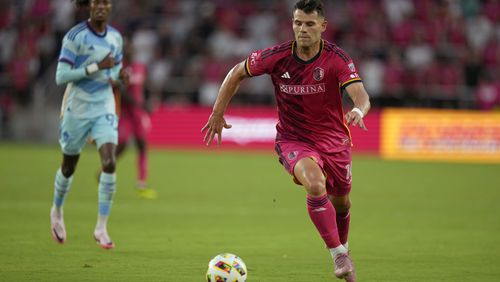 St. Louis City's Eduard Lowen brings the ball down the pitch during the first half of an MLS soccer match against the Colorado Rapids Wednesday, June 19, 2024, in St. Louis. (AP Photo/Jeff Roberson)
