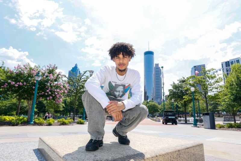  Afro-Latin singer-songwriter Chicocurlyhead, originally from Panama and raised in Atlanta, poses for a photograph at Centennial Olympic Park on Thursday, June 13, 2024. He is set to release his new EP on June 21.
(Miguel Martinez / AJC)