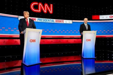 
                        Former President Donald Trump, left, and President Joe Biden during a commercial break in their debate in Atlanta on Thursday night, June 27, 2024. The debate had analysts in Asia fretting. (Ruth Fremson/The New York Times)
                      