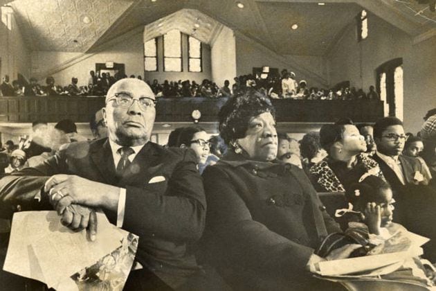 Alberta Williams King, right, attends a service at Ebenezer Baptist Church with husband Martin Luther King Sr. in January 1970. Alberta King was murdered in the same church in 1974 as she played the organ. (Chuck Vollertsen/AJC Archive at GSU Library AJCP443-116c)