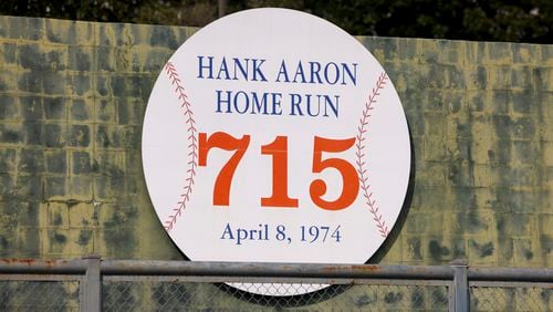 A portion of the outfield wall of Atlanta-Fulton County Stadium is shown honoring Hank Aaron’s 715th home run in a parking lot owned by Georgia State University, Wednesday, March 20, 2024, in Atlanta. (Jason Getz / jason.getz@ajc.com)