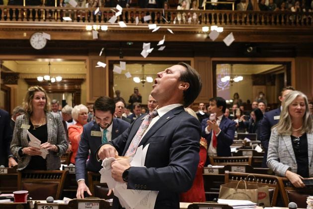 Rep. James Burchett (R-Waycross) celebrates at the conclusion of the legislative session in the House Chamber on Sine Die, the last day of the General Assembly at the Georgia State Capitol in Atlanta on Wednesday, March 29, 2023. (Natrice Miller/ natrice.miller@ajc.com)