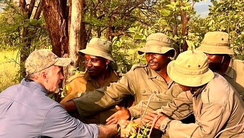 U.S. Rep. Buddy Carter meets with anti-poaching patrol agents in the Serengeti.