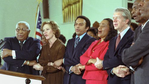 President Jimmy Carter sings with, from left, Martin Luther King Sr., Rosalynn Carter, Andrew Young and Coretta Scott King at Ebenezer Baptist Church in Atlanta on Jan. 14, 1979. Carter was there to accept the Martin Luther King Jr. Nonviolence Peace Prize. (Jimmy Carter Library)