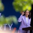 Vice President Kamala Harris speaks June 18 at a Juneteenth Block Party campaign event outside her new campaign headquarters in Atlanta. (Arvin Temkar/The Atlanta Journal-Constitution)