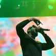 Rapper Gucci Mane performs alongside music producer Jermaine Dupri, during Dupri's "The South Got Something to Say" show at the Caesars Superdome in New Orleans. He'll perform at Atlanta Symphony Hall this fall. (TYSON HORNE / TYSON.HORNE@AJC.COM)