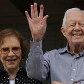 Former President Jimmy Carter and first lady Rosalynn Carter wave to a beauty queen during the Peanut Festival on Saturday September 26, 2015 in Plains. The former president has been in hospice care since February 2023. Rosalynn Carter passed away in November. Ben Gray / bgray@ajc.com