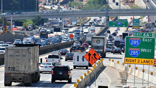 Construction continues on a new I-285 interchange at Ga. 400. The project was scheduled to be open to traffic by the end of the year, but the Georgia Department of Transportation now says the work could last until the third quarter of 2022. (Hyosub Shin / Hyosub.Shin@ajc.com)