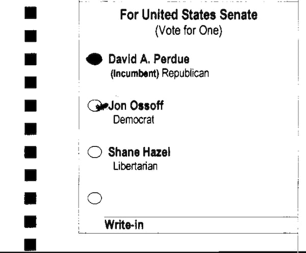 An extra mark in the U.S. Senate race was called ambiguous. A bipartisan ballot review team decided to count this ballot for Republican David Perdue.