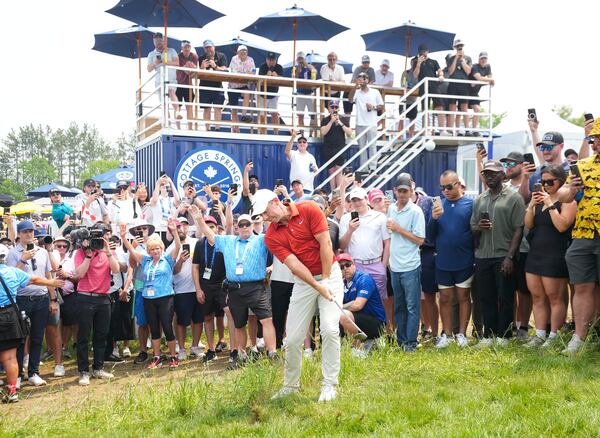 Rory McIlroy hits a chip shot from the rough on the fifth hole during the second round of the Canadian Open golf tournament in Caledon, Ontario, Friday, June 6, 2025. (Nathan Denette/The Canadian Press via AP)