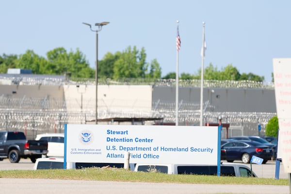 A sign for the Stewart Detention Center is located at the entrance, noted April 27, 2025. This facility is a privately operated, all-male detention center managed by CoreCivic and is situated in Lumpkin. (Miguel Martinez/AJC)