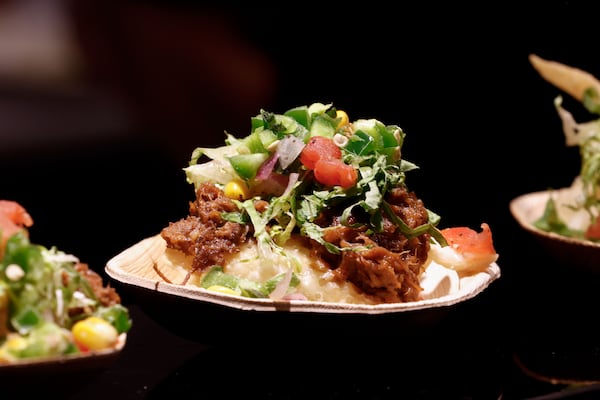 Asian nachos will be the only menu item at the Taqueria Tsunami food stall inside Truist Park. (Natrice Miller/AJC)