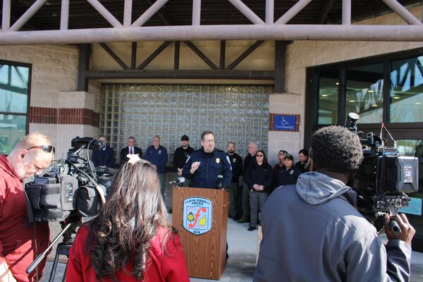 Floyd County police Sgt. Chris Fincher speaks to reporters outside the Rome-Floyd County Law Enforcement building Thursday morning.