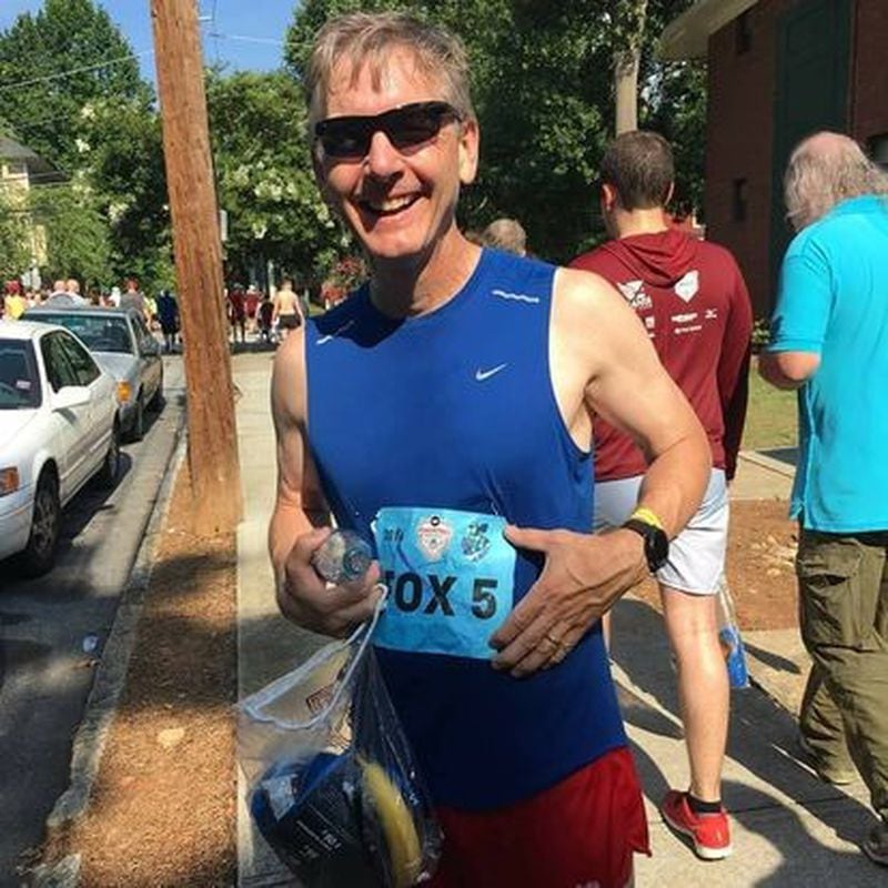 Randy Travis on his way to MARTA after hitting the medical tent in 2016 after the AJC Peachtree Road Race. CONTRIBUTED