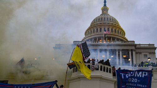 
                        FILE — Rioters force their way into the Capitol in Washington, Jan. 6, 2021. The justices will hear arguments on Tuesday, April 16, 2024 in a case that could alter hundreds of prosecutions for the assault on the Capitol and help define its meaning. (Kenny Holston/The New York Times)
                      